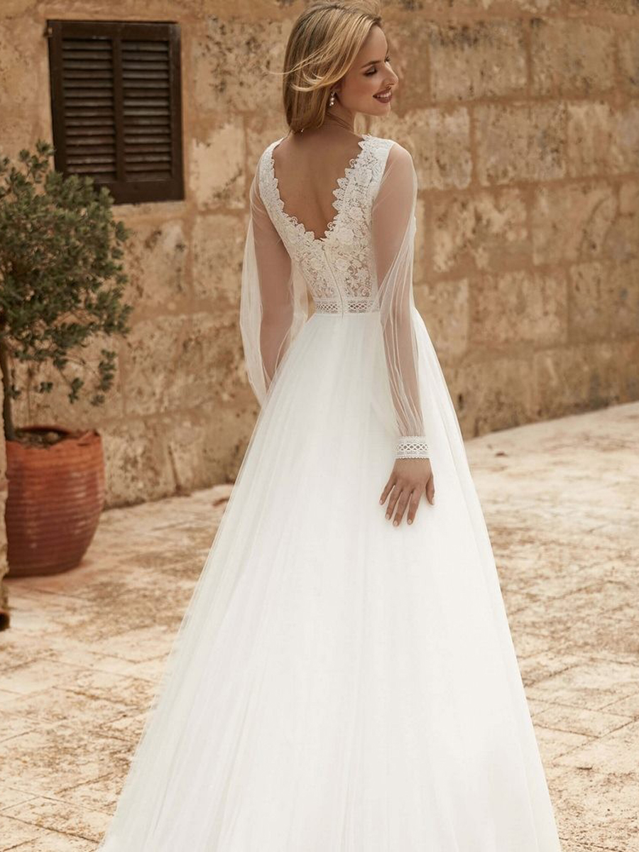 Vestido de novia con mangas desmontables 2027